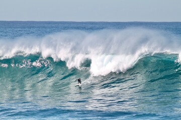 Surfer on a Huge Australian Wave. This is tow-in surf with Jet ski. the exact place is Coogee.