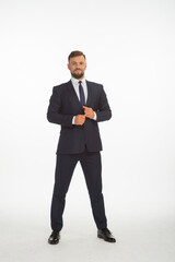 Obraz premium young businessman in a suit posing with different emotions on a white background in the studio isolated in full growth