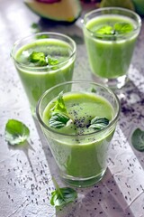 Healthy green smoothie with avocado, banana and spinach. Top view. Detox drink.