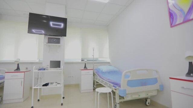 Bright new ward in a modern clinic. Hospital ward interior. New modern room in the hospital.
