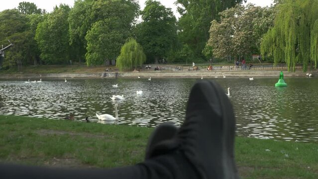 Nothing beats relaxing in a Park in Berlin of Germany, watching swans swim and people go about their daily lives. Sometimes you need to stop and chill, think about nothing and let life flow.