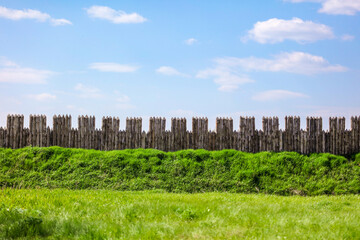 Wooden fence against the sky.