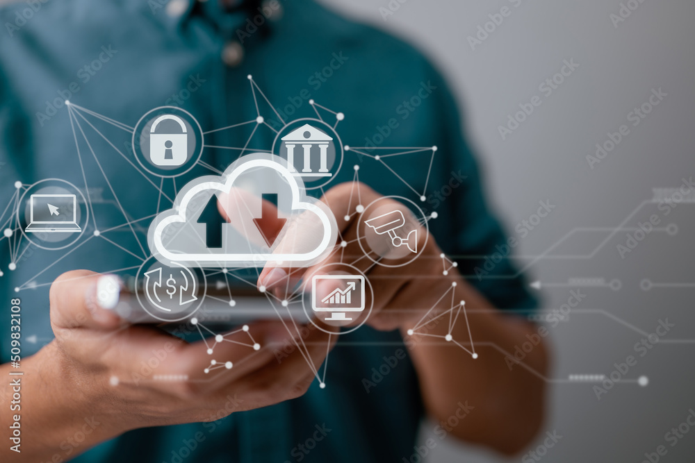 Poster A guy uses a smartphone while holding a cloud computing diagram. Cloud computing, data storage, networking, and internet service principles.