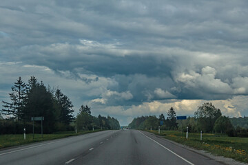 Asphalt road going into the distance through