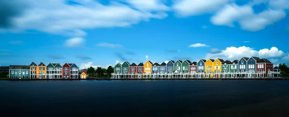 Foto auf Acrylglas panorama view of the colorful rainbow houses and lake in Houten © makasana photo