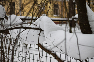 Soft snow sliding like a blanket during the thaw