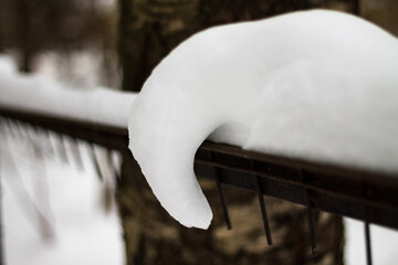 Soft snow sliding like a blanket during the thaw