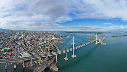 Cebu City, Philippines - Panoramic aerial of the Metro Cebu Skyline and Cebu - Cordova Bridge.