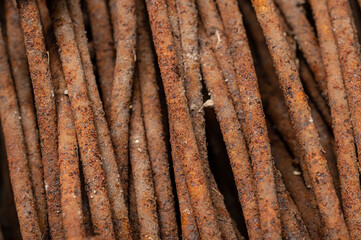 Rusty wire, john deere green patina with metal gears and close up macro of rusty steel bolts and paint