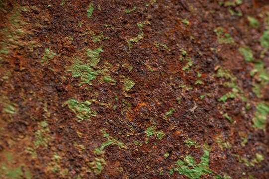 Rusty wire, john deere green patina with metal gears and close up macro of rusty steel bolts and paint