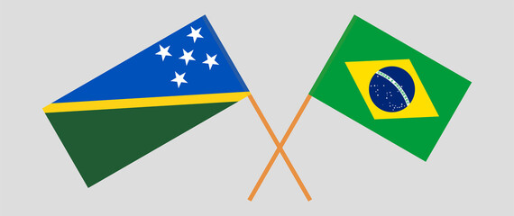 Crossed flags of Solomon Islands and Brazil. Official colors. Correct proportion