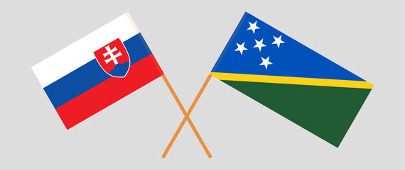 Crossed flags of Slovakia and Solomon Islands. Official colors. Correct proportion