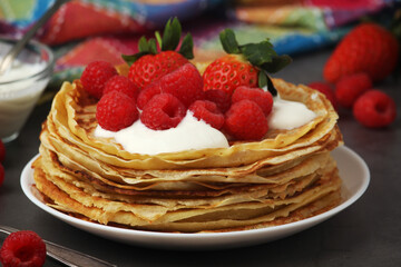 Russian cuisine national dish bliny with fresh berries