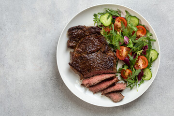 beef steak with fresh vegetable salad
