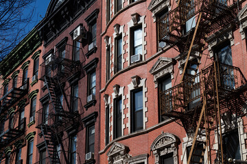 Obraz premium Row of Beautiful Old Brick Residential Buildings on the Lower East Side of New York City