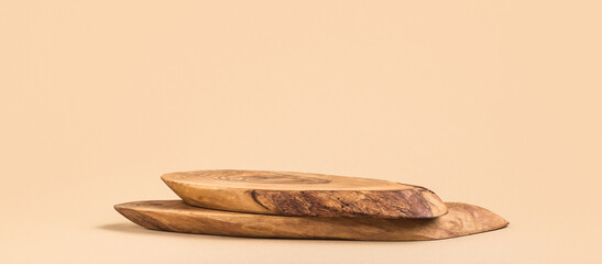 Background for products cosmetics, food or jewellery. Rustic wood pieces podium. Front view.	

