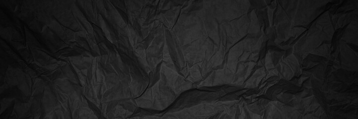 Black crumpled sheet of paper, banner