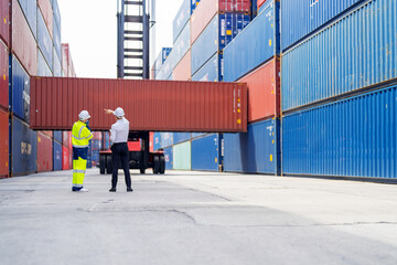 Container yard manager received the briefing work plan from the supervisor at container yard warehouse.