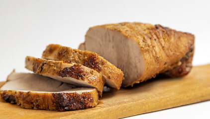 Cooking meat. Roast pork on a white background.