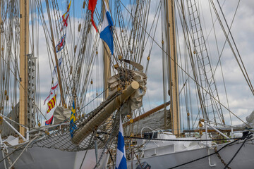 Obraz premium Fore of the two schooner and training boats Gladan and Falken a pier, celebrating 70 year, a sunny summer day in Stockholm