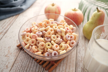 close up of colorful cereal corn flakes in a bowl 