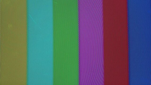 Old retro television, colorful screen close-up. Broken old-fashioned TV with noise, bad signal reception, cinematography concept. 