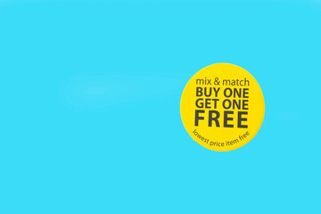 buy one get one free yellow tag on blue background