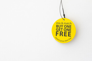 buy one get one free yellow tag on white background