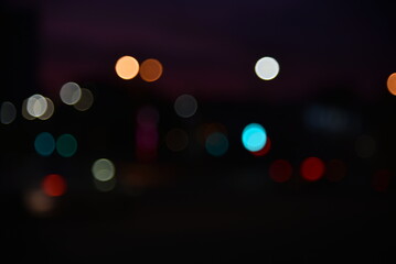 Defocused night traffic multicolored lights evening city Chelyabinsk strange background