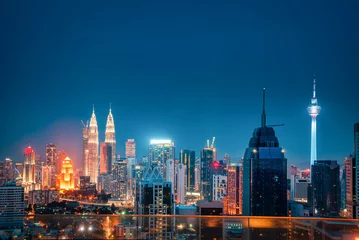 Foto op Canvas Stadsgezicht van de skyline van de stad van Kuala Lumpur & 39 s nachts in Maleisië. © nuttawutnuy