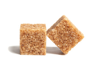Two pieces brown cane sugar cubes isolated on white background