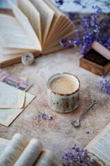 Vintage still life with old books and a cup of coffee