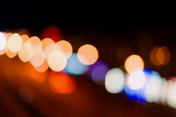 Blurred background of city lights in the evening