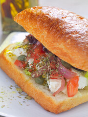 a greek salad sandwich - 509862179