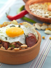 beans with sausage and fried egg - 509862190