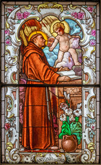 Obraz na płótnie Canvas MATERA, ITALY - MARCH 7, 2022: The St. Anthony of Padua in the baroque stained glass in the church Chiesa di San Francesco Assisi.