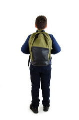 Back to school concept. Adorable schoolboy with backpacks looking at wall. Back view. Isolated on white background. Full length. Modern teenage boy with backpack looking at wall.