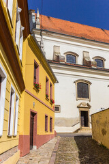 Fototapeta na wymiar Colorful houses and the Michala church in Znojmo, Czech Republic