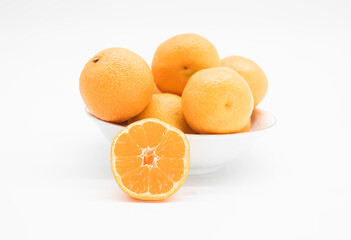whole and slice Tangerine or kamala isolated on white background