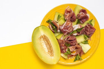 Fresh serrano ham salad with cantaloupe melon