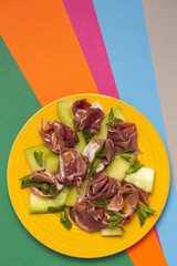 Fresh serrano ham salad with cantaloupe melon