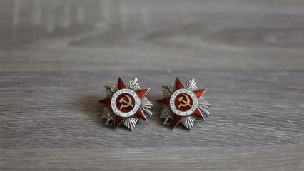 Two orders of the USSR veteran of the Second World War are on the table.
