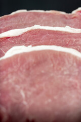 Raw veal meat fillet for grilling, Tenderloin fillet mignon on dark background.