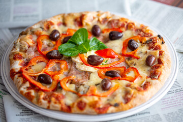 Pizza. Pizza delivery.
Brilliant juicy hot pizza. Pizza in the oven.
Margarita. hot food photography. Fast food. Home delivery. Favorite Italian food. Tasty food. Dinner. Pizza with olives. Cheese. 