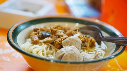 Chicken noodles add meatballs in a bowl without using Indonesian special spices, looks delicious and tasty