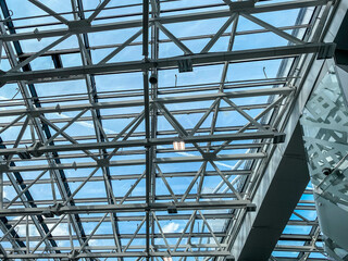 ceiling in a glass building on metal supports. glass ceiling, modern loft style. fashion house design, transparent roof