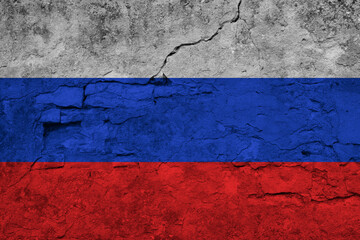 Patriotic cracked wall background in colors of national flag. Russia
