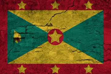 Patriotic cracked wall background in colors of national flag. Grenada