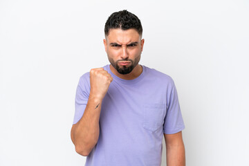 Young Arab handsome man isolated on white background with unhappy expression
