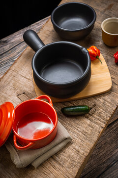 Pans of feijoada prepared on the table decorated to receive the food famous Brazilian food
